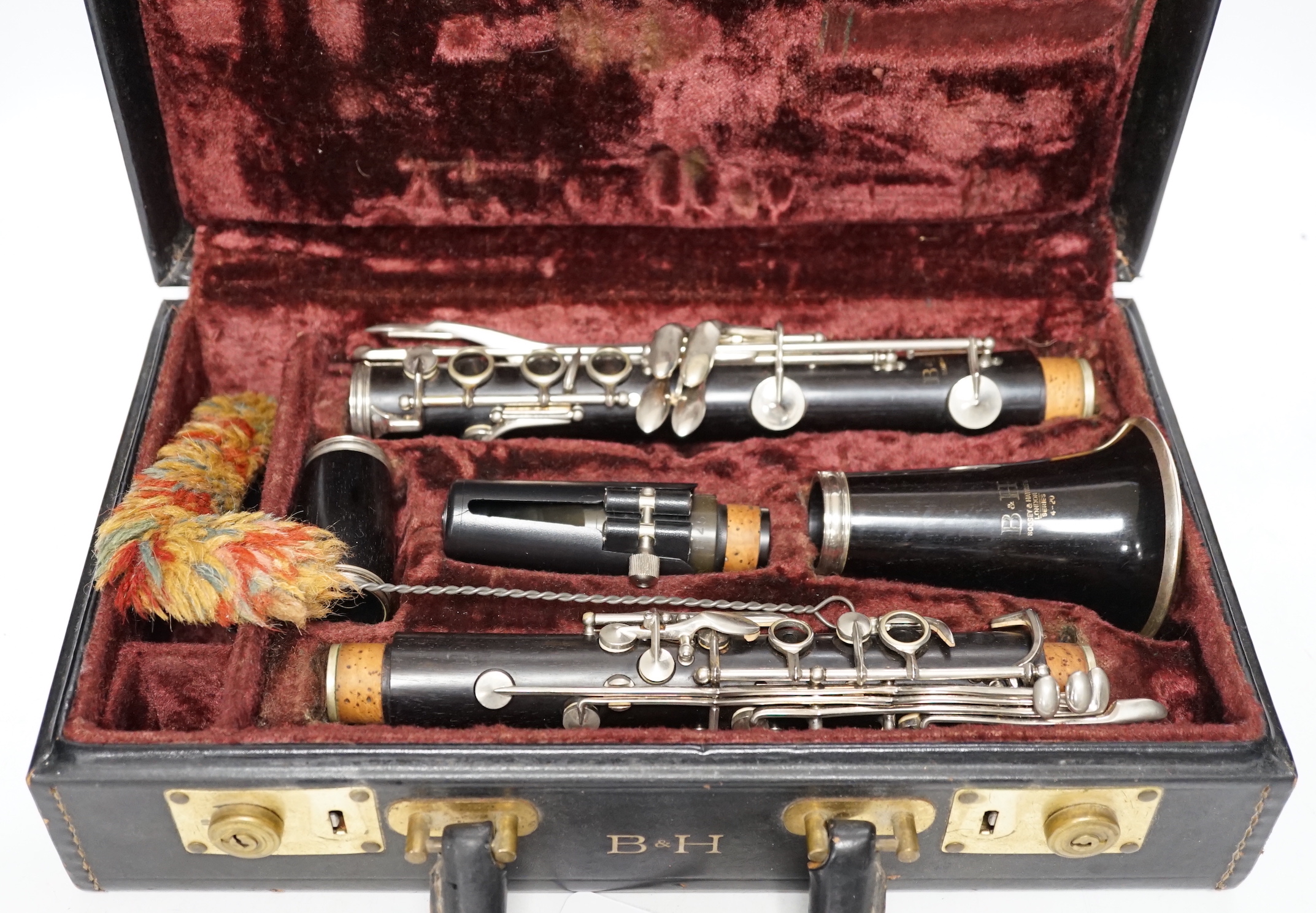 A cased Boosey & Hawkes 4-20 clarinet, in a fine original fitted leather case